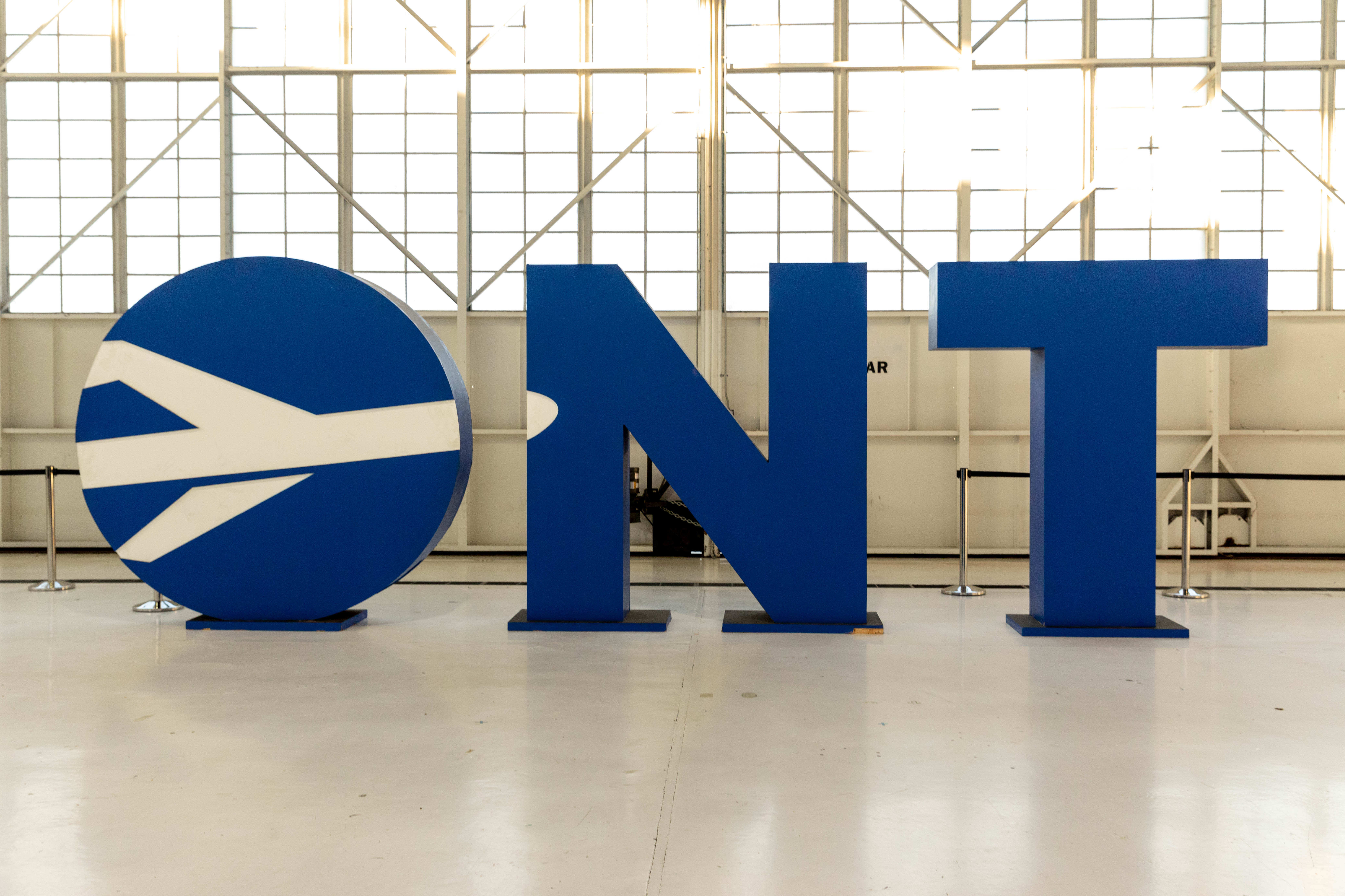 You must take the airport bus to the transportation lot outside the airport to meet your driver